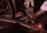 Image of wooden wheels United States USA, 1975, second 46 stock footage video 65675048714