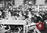 Image of American Army soldiers in YMCA club during World War I European Theater, 1917, second 3 stock footage video 65675048746