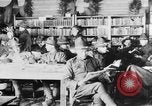 Image of American Army soldiers in YMCA club during World War I European Theater, 1917, second 7 stock footage video 65675048746