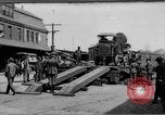 Image of Military equipment being unloaded from "Liberty Loan Train." Richmond Virginia USA, 1918, second 1 stock footage video 65675048756