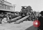Image of Military equipment being unloaded from "Liberty Loan Train." Richmond Virginia USA, 1918, second 5 stock footage video 65675048756