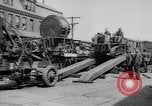Image of Military equipment being unloaded from "Liberty Loan Train." Richmond Virginia USA, 1918, second 16 stock footage video 65675048756