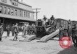 Image of Military equipment being unloaded from "Liberty Loan Train." Richmond Virginia USA, 1918, second 20 stock footage video 65675048756