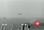 Image of Royal Navy Supermarine Attacker F1 aircraft practice touch and go landings on American aircraft carrier USS Antietam Atlantic Ocean, 1953, second 3 stock footage video 65675048898