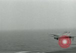Image of Royal Navy Supermarine Attacker F1 aircraft practice touch and go landings on American aircraft carrier USS Antietam Atlantic Ocean, 1953, second 11 stock footage video 65675048898