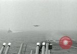 Image of Royal Navy Supermarine Attacker F1 aircraft practice touch and go landings on American aircraft carrier USS Antietam Atlantic Ocean, 1953, second 13 stock footage video 65675048898