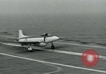 Image of Royal Navy Supermarine Attacker F1 aircraft practice touch and go landings on American aircraft carrier USS Antietam Atlantic Ocean, 1953, second 19 stock footage video 65675048898