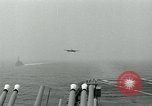 Image of Royal Navy Supermarine Attacker F1 aircraft practice touch and go landings on American aircraft carrier USS Antietam Atlantic Ocean, 1953, second 25 stock footage video 65675048898