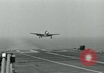 Image of Royal Navy Supermarine Attacker F1 aircraft practice touch and go landings on American aircraft carrier USS Antietam Atlantic Ocean, 1953, second 29 stock footage video 65675048898
