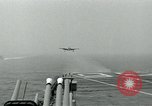 Image of Royal Navy Supermarine Attacker F1 aircraft practice touch and go landings on American aircraft carrier USS Antietam Atlantic Ocean, 1953, second 34 stock footage video 65675048898