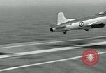 Image of Royal Navy Supermarine Attacker F1 aircraft practice touch and go landings on American aircraft carrier USS Antietam Atlantic Ocean, 1953, second 39 stock footage video 65675048898