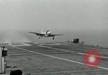 Image of Royal Navy Supermarine Attacker F1 aircraft practice touch and go landings on American aircraft carrier USS Antietam Atlantic Ocean, 1953, second 45 stock footage video 65675048898