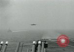 Image of Royal Navy Supermarine Attacker F1 aircraft practice touch and go landings on American aircraft carrier USS Antietam Atlantic Ocean, 1953, second 53 stock footage video 65675048898
