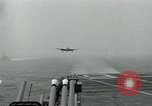 Image of Royal Navy Supermarine Attacker F1 aircraft practice touch and go landings on American aircraft carrier USS Antietam Atlantic Ocean, 1953, second 55 stock footage video 65675048898