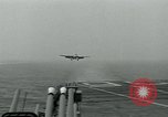 Image of British Royal Navy Hawker Seahawk aircraft practice arrested landings on the carrier USS Antietam Atlantic Ocean, 1953, second 3 stock footage video 65675048900