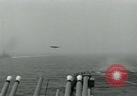 Image of British Royal Navy Hawker Seahawk aircraft practice arrested landings on the carrier USS Antietam Atlantic Ocean, 1953, second 9 stock footage video 65675048900
