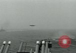 Image of British Royal Navy Hawker Seahawk aircraft practice arrested landings on the carrier USS Antietam Atlantic Ocean, 1953, second 10 stock footage video 65675048900