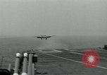 Image of British Royal Navy Hawker Seahawk aircraft practice arrested landings on the carrier USS Antietam Atlantic Ocean, 1953, second 14 stock footage video 65675048900