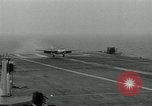 Image of British Royal Navy Hawker Seahawk aircraft practice arrested landings on the carrier USS Antietam Atlantic Ocean, 1953, second 15 stock footage video 65675048900
