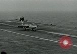 Image of British Royal Navy Hawker Seahawk aircraft practice arrested landings on the carrier USS Antietam Atlantic Ocean, 1953, second 16 stock footage video 65675048900