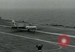 Image of British Royal Navy Hawker Seahawk aircraft practice arrested landings on the carrier USS Antietam Atlantic Ocean, 1953, second 17 stock footage video 65675048900