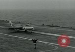 Image of British Royal Navy Hawker Seahawk aircraft practice arrested landings on the carrier USS Antietam Atlantic Ocean, 1953, second 18 stock footage video 65675048900