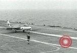 Image of British Royal Navy Hawker Seahawk aircraft practice arrested landings on the carrier USS Antietam Atlantic Ocean, 1953, second 19 stock footage video 65675048900