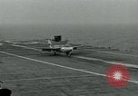 Image of British Royal Navy Hawker Seahawk aircraft practice arrested landings on the carrier USS Antietam Atlantic Ocean, 1953, second 22 stock footage video 65675048900