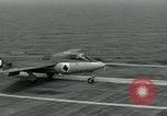 Image of British Royal Navy Hawker Seahawk aircraft practice arrested landings on the carrier USS Antietam Atlantic Ocean, 1953, second 24 stock footage video 65675048900