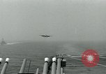 Image of British Royal Navy Hawker Seahawk aircraft practice arrested landings on the carrier USS Antietam Atlantic Ocean, 1953, second 26 stock footage video 65675048900