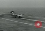 Image of British Royal Navy Hawker Seahawk aircraft practice arrested landings on the carrier USS Antietam Atlantic Ocean, 1953, second 30 stock footage video 65675048900