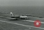 Image of British Royal Navy Hawker Seahawk aircraft practice arrested landings on the carrier USS Antietam Atlantic Ocean, 1953, second 31 stock footage video 65675048900