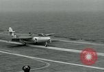 Image of British Royal Navy Hawker Seahawk aircraft practice arrested landings on the carrier USS Antietam Atlantic Ocean, 1953, second 33 stock footage video 65675048900
