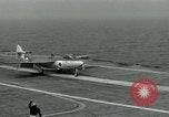 Image of British Royal Navy Hawker Seahawk aircraft practice arrested landings on the carrier USS Antietam Atlantic Ocean, 1953, second 34 stock footage video 65675048900