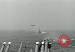 Image of British Royal Navy Hawker Seahawk aircraft practice arrested landings on the carrier USS Antietam Atlantic Ocean, 1953, second 36 stock footage video 65675048900