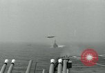 Image of British Royal Navy Hawker Seahawk aircraft practice arrested landings on the carrier USS Antietam Atlantic Ocean, 1953, second 37 stock footage video 65675048900
