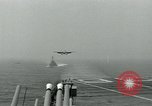 Image of British Royal Navy Hawker Seahawk aircraft practice arrested landings on the carrier USS Antietam Atlantic Ocean, 1953, second 39 stock footage video 65675048900
