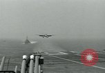 Image of British Royal Navy Hawker Seahawk aircraft practice arrested landings on the carrier USS Antietam Atlantic Ocean, 1953, second 40 stock footage video 65675048900