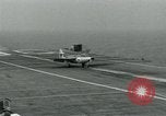 Image of British Royal Navy Hawker Seahawk aircraft practice arrested landings on the carrier USS Antietam Atlantic Ocean, 1953, second 42 stock footage video 65675048900