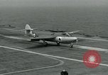 Image of British Royal Navy Hawker Seahawk aircraft practice arrested landings on the carrier USS Antietam Atlantic Ocean, 1953, second 43 stock footage video 65675048900