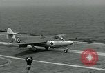 Image of British Royal Navy Hawker Seahawk aircraft practice arrested landings on the carrier USS Antietam Atlantic Ocean, 1953, second 45 stock footage video 65675048900