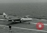 Image of British Royal Navy Hawker Seahawk aircraft practice arrested landings on the carrier USS Antietam Atlantic Ocean, 1953, second 46 stock footage video 65675048900
