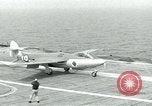 Image of British Royal Navy Hawker Seahawk aircraft practice arrested landings on the carrier USS Antietam Atlantic Ocean, 1953, second 47 stock footage video 65675048900