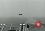 Image of British Royal Navy Hawker Seahawk aircraft practice arrested landings on the carrier USS Antietam Atlantic Ocean, 1953, second 50 stock footage video 65675048900