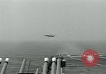 Image of British Royal Navy Hawker Seahawk aircraft practice arrested landings on the carrier USS Antietam Atlantic Ocean, 1953, second 51 stock footage video 65675048900