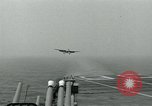 Image of British Royal Navy Hawker Seahawk aircraft practice arrested landings on the carrier USS Antietam Atlantic Ocean, 1953, second 52 stock footage video 65675048900