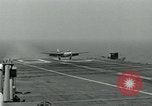 Image of British Royal Navy Hawker Seahawk aircraft practice arrested landings on the carrier USS Antietam Atlantic Ocean, 1953, second 54 stock footage video 65675048900
