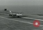 Image of British Royal Navy Hawker Seahawk aircraft practice arrested landings on the carrier USS Antietam Atlantic Ocean, 1953, second 55 stock footage video 65675048900