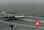 Image of British Royal Navy Hawker Seahawk aircraft practice arrested landings on the carrier USS Antietam Atlantic Ocean, 1953, second 57 stock footage video 65675048900