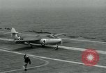 Image of British Royal Navy Hawker Seahawk aircraft practice arrested landings on the carrier USS Antietam Atlantic Ocean, 1953, second 58 stock footage video 65675048900